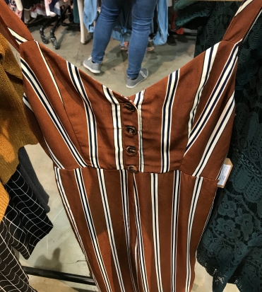 Ok, so it's a horrible picture but this was one of my favorite striped jumpsuits in the perfect fall colors! Again, you can layer with a tee for more coverage/warmth. Note the buttons... another trend to discuss below!
